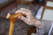 Photo: hand of a senior person on cane hand of a senior person on cane