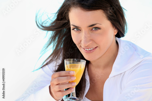 Photo: Woman drinking juice Woman drinking juice