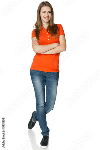 Photo: Happy and carefree teenage girl in full length Happy and carefree teenage girl in full length