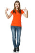 Young happy casual woman pointing at herself