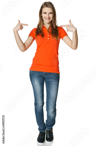 Photo: Young happy casual woman pointing at herself Young happy casual woman pointing at herself