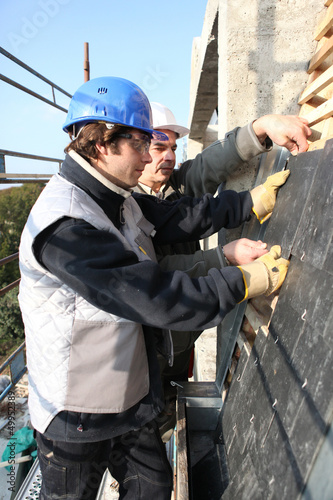 Photo: Two roofers Two roofers