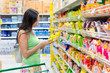 Woman checking food labelling