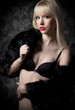 Beautiful blonde woman in fur coat