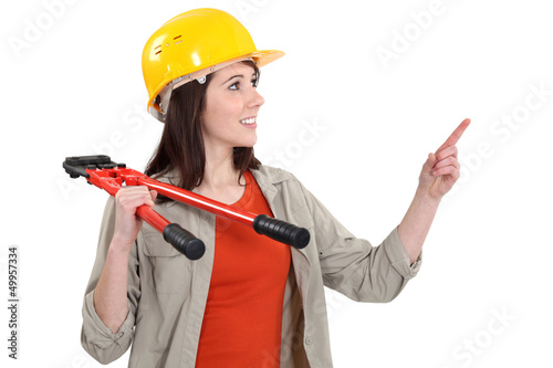 Photo: A handywoman with pliers. A handywoman with pliers.