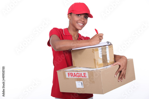 Photo: Woman making a delivery Woman making a delivery