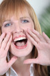 Foto: Closeup of a woman screaming Closeup of a woman screaming