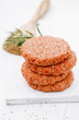 Raw burgers for hamburgers, in a pile
