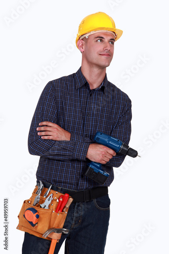 Photo: craftsman holding a drill craftsman holding a drill