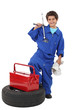 Young boy dressed as a mechanic