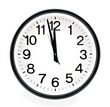 Black wall clock, two minutes to twelve