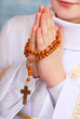 praying boy going to the first holy communion