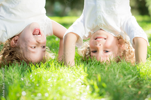Photo: Child standing upside down Child standing upside down
