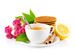 tea in cup with waffles and bouquet roses isolated on white