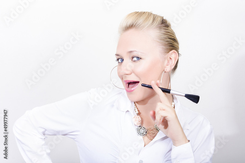 Photo: Glamor fashion woman with beauty products Glamor fashion woman with beauty products