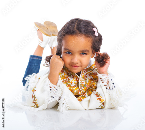 Photo: Girl lying and smiling Girl lying and smiling