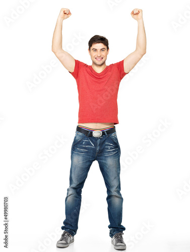 Photo: man with in casuals with raised hands up isolated man with in casuals with raised hands up isolated