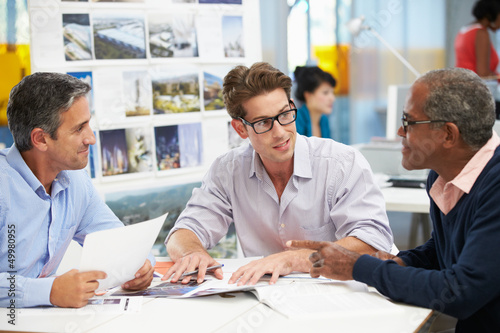 Photo: Group Of Men Meeting In Creative Office Group Of Men Meeting In Creative Office
