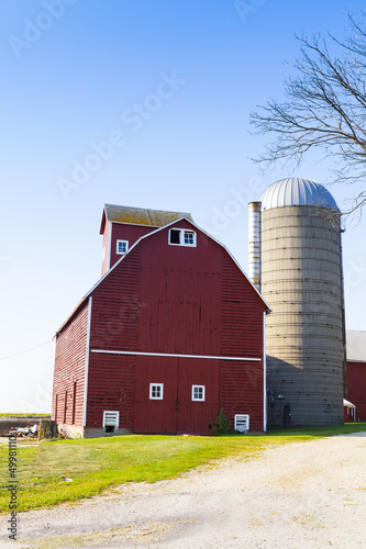 Photo: Traditional American Red Farm in Summer Traditional American Red Farm in Summer