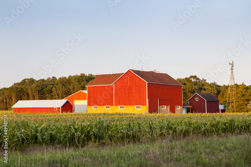 Photo: Traditional American Red Farm in Summer Traditional American Red Farm in Summer