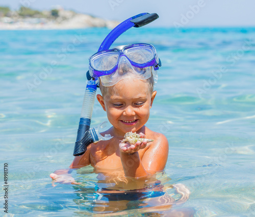 Photo: Boy swimming in sea Boy swimming in sea