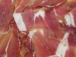 Rodajas de jamón serrano. Slices of ham.