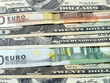 close up of euro and dollars