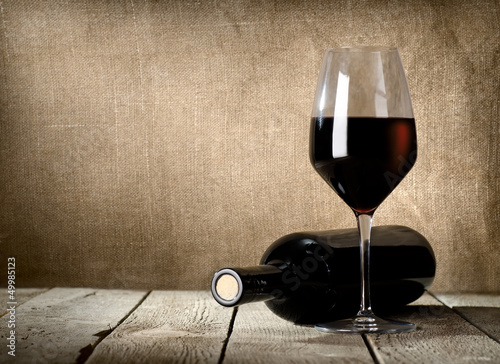 Photo: Black bottle and red wine Black bottle and red wine