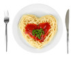 Cooked spaghetti carefully arranged in  heart shape and topped