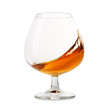 Cognac splashes in a glass