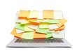 Laptop covered with stickers, isolated on white background