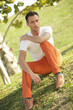 Photo: Stock image of a man sitting on the grass Stock image of a man sitting on the grass