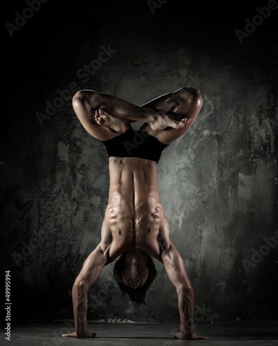Photo: Young b-boy man with naked torso Young b-boy man with naked torso