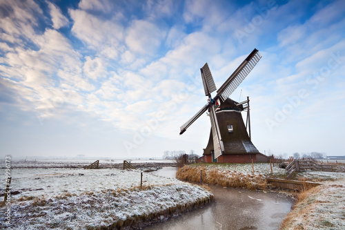 Photo: Dutch windmill and cloudscape Dutch windmill and cloudscape