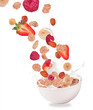 Foto: Healthy food and milk with flying cereals and fruit on white Healthy food and milk with flying cereals and fruit on white