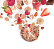 Foto: Healthy food and milk with flying cereals and fruit on white Healthy food and milk with flying cereals and fruit on white