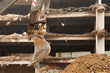Destruction of concrete building with equipment