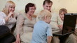 Family using laptop at home