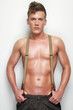 Handsome Man Undressed with Suspenders
