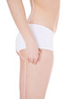 Photo: Weibliche Person checkt ihre Haut auf Cellulite Weibliche Person checkt ihre Haut auf Cellulite