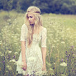 beautiful young girl in a summer field