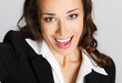 Happy business woman, over gray