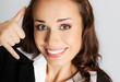 Businesswoman with call me gesture, over gray