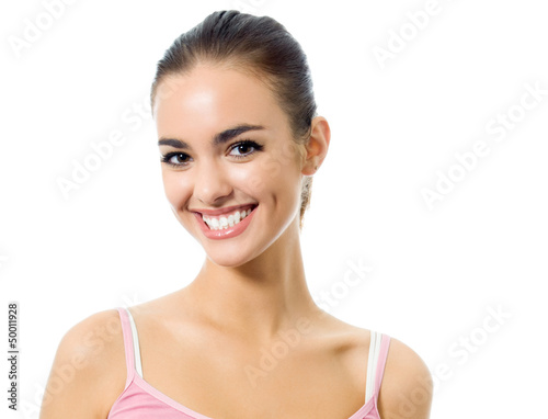 Photo: Young happy smiling woman, isolated over white Young happy smiling woman, isolated over white