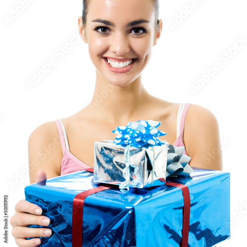 Photo: Young smiling woman with gift, isolated Young smiling woman with gift, isolated