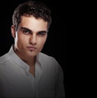 Photo: Fashion portrait of handsome sexy young man Fashion portrait of handsome sexy young man