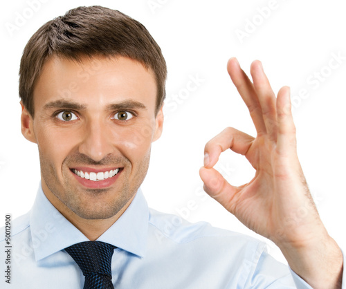 Photo: Businessman with okay gesture, isolated Businessman with okay gesture, isolated
