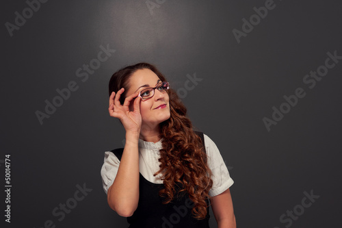 Photo: smiley brunette in glasses smiley brunette in glasses