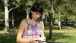 Video: young pregnant woman leafs through a notepad young pregnant woman leafs through a notepad