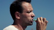 Man brushing his teeth, slow motion shot at 240fps